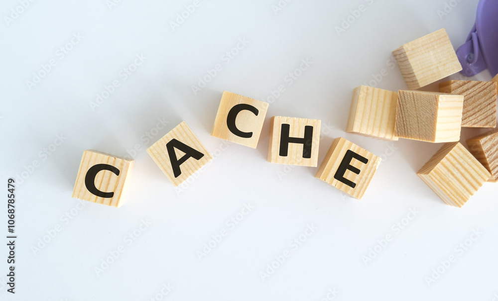 Obraz premium Word CACHE written on wooden cubes on a light background