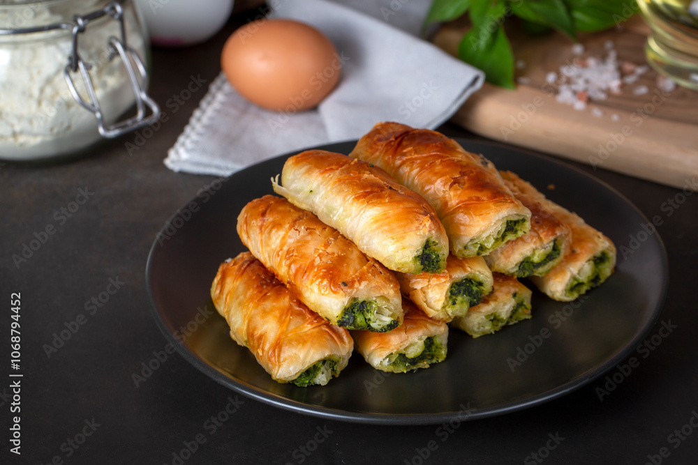 Turkish Tepsi Boregi, Round Borek, Tray pastry (Turkish name; rulo borek - sigara boregi). Spinach Pie. Turkish Tepsi Boregi, Round Borek, Tray pastry (Turkish name; rulo borek - sigara boregi). Spinach Pie.