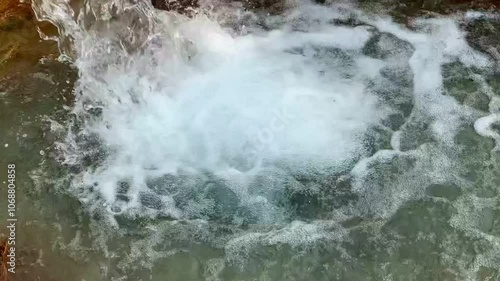 Tube Well Water. Water is coming out from a Tube Well. Irrigation water flow from pipe for agriculture fields. slow motion water flash. Beautiful 4k footage.