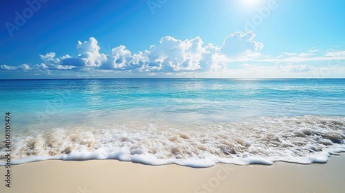 A tranquil beach scene featuring soft sands and gentle ocean waves