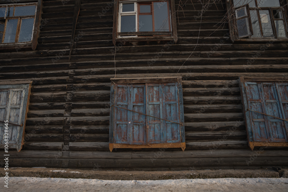 wooden traditional shutters on a wooden house, russia - dec 2 2023 wooden traditional shutters on a wooden house, russia - dec 2 2023