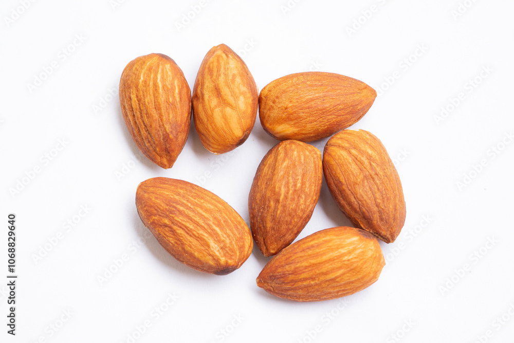 Brown almond nut seeds isolated. Almond nut seeds. Brown almond nut seeds isolated. Almond nut seeds.