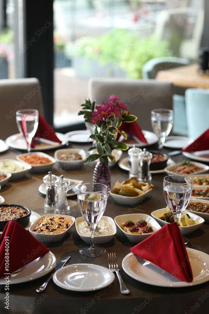 A beautifully decorated table set with a variety of Turkish meze, perfect for a special occasion