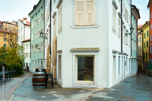 Empty street of Trieste historic town center of the city with traditional buildings an alleys. Architecture of Trieste in Friuli Venezia Giulia, Italy photo