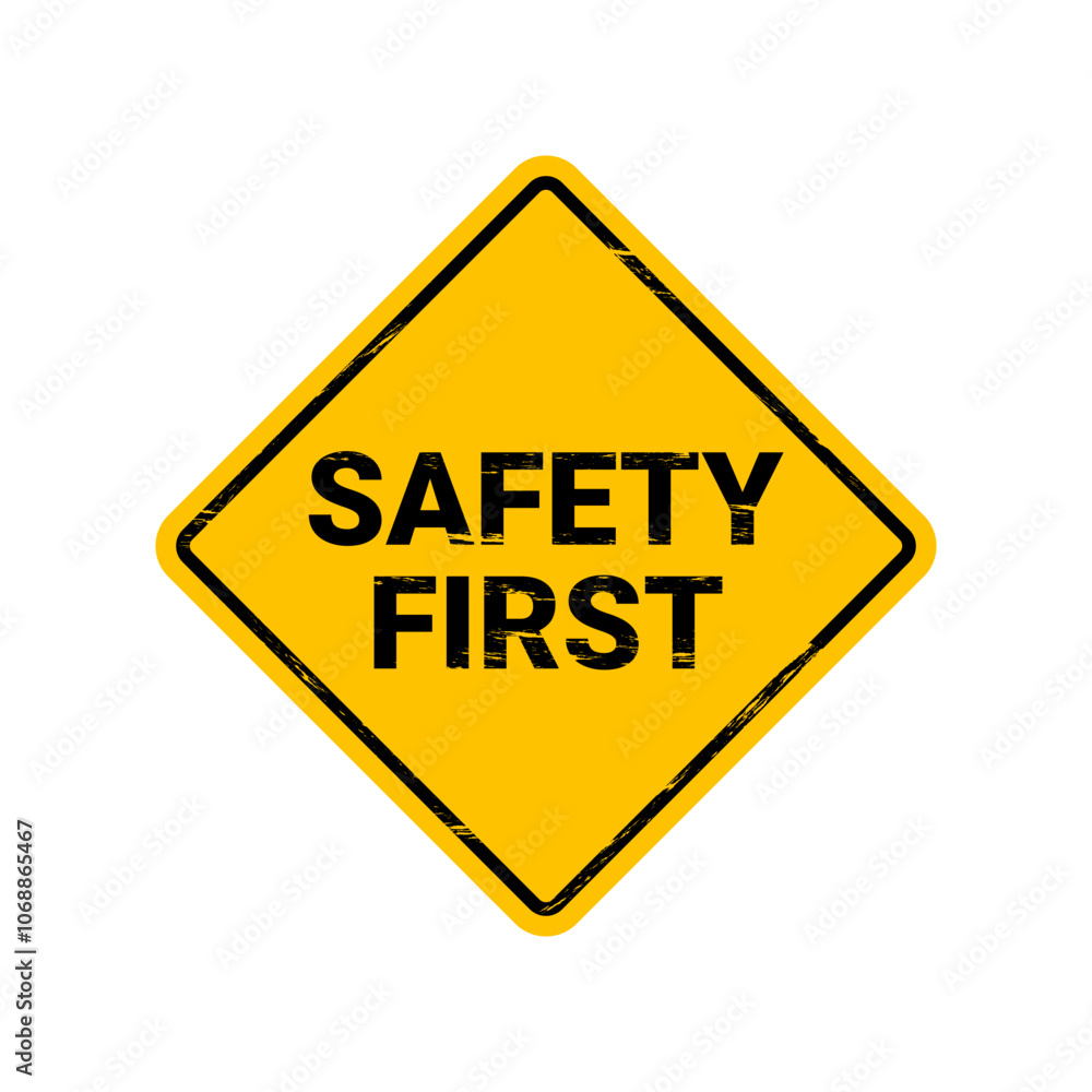 Safety First Warning Sign on White Background Safety First Warning Sign on White Background
