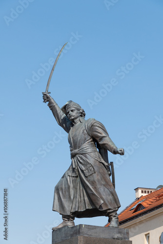 Monument to Jan Kilinski. Warsaw, Poland. Bronze sculpture. statue on a pedestal. Old Town. photo