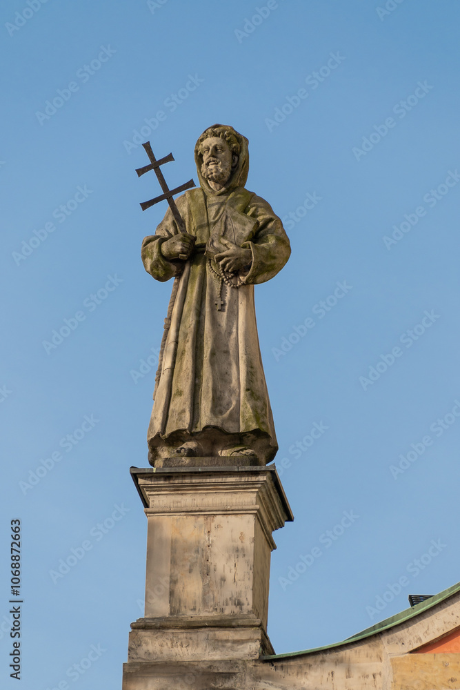 Sculptures on the facade of the Church of the Transfiguration of Our Lord. Baroque church of the Capuchin order from the end of the 17th century. Warsaw, Poland. Sculptures on the facade of the Church of the Transfiguration of Our Lord. Baroque church of the Capuchin order from the end of the 17th century. Warsaw, Poland.
