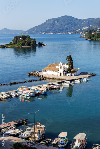 Vlacherna monastery and Mouse Island at Mediterranean sea from above portrait format on Corfu island in Greece photo