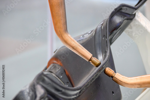 The automotive parts spot welding process by robotic system.