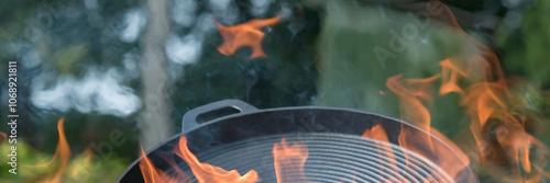Tableau sur toile Calcining a new frying pan over the fire