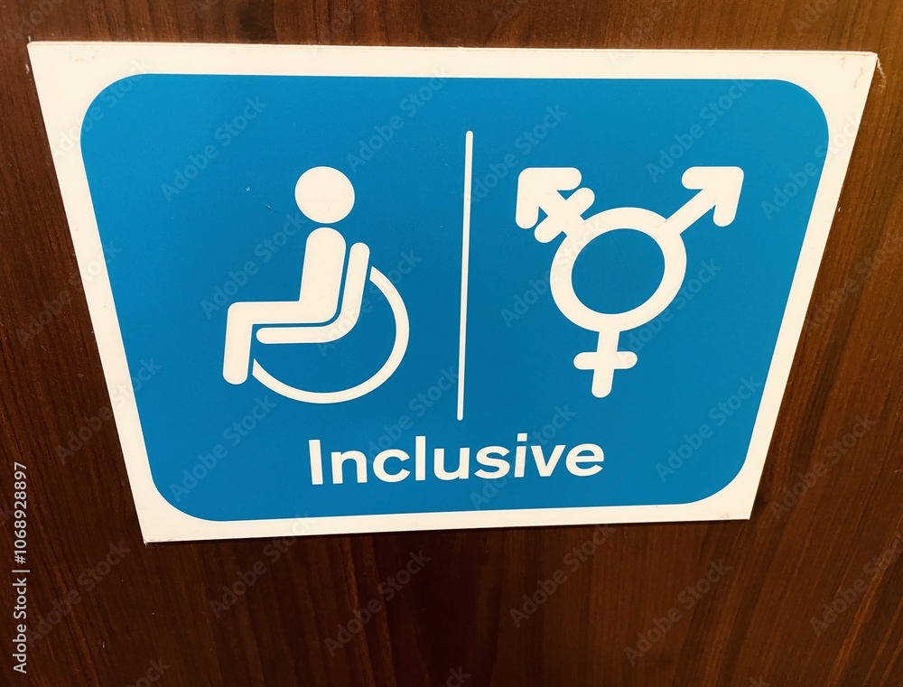 Inclusive signage on toilet door at motorway service station