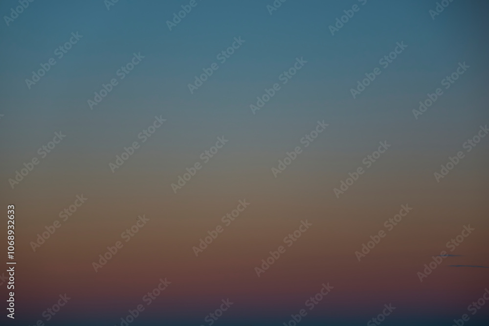 Stunning palette of vibrant blues and fiery oranges in the sky Stunning palette of vibrant blues and fiery oranges in the sky