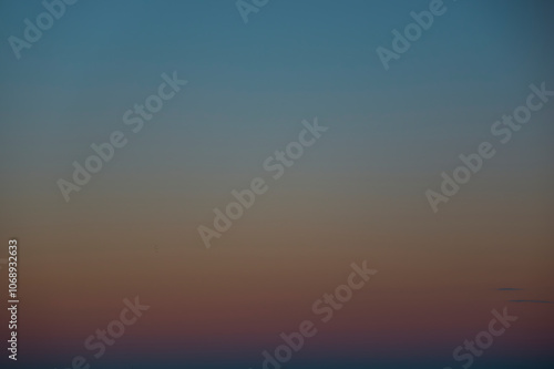 Stunning palette of vibrant blues and fiery oranges in the sky