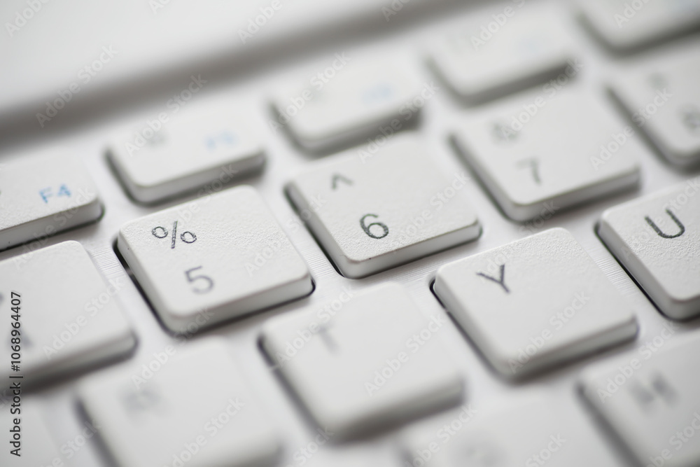 Close-up of Modern White Keyboard Keys for Technology and Computing Background Close-up of Modern White Keyboard Keys for Technology and Computing Background