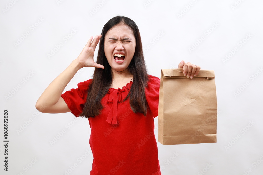 Hispanic pretty woman screaming with hands up in the air. Delivery and take away concept Hispanic pretty woman screaming with hands up in the air. Delivery and take away concept