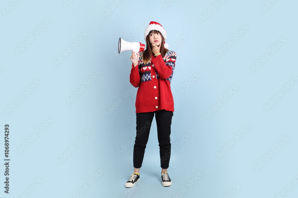 Woman wearing Santa hat Woman wearing Santa hat