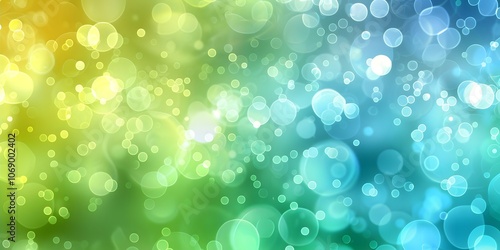 A vibrant abstract background featuring colorful bokeh effects in shades of green and blue.