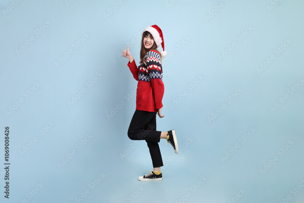 Woman wearing Santa hat Woman wearing Santa hat