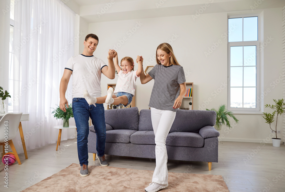 Parents and kid having fun together at home, laughing and playing during family leisure time. They enjoy entertainment, bonding over shared activities, and creating joyful moments. Parents and kid having fun together at home, laughing and playing during family leisure time. They enjoy entertainment, bonding over shared activities, and creating joyful moments.
