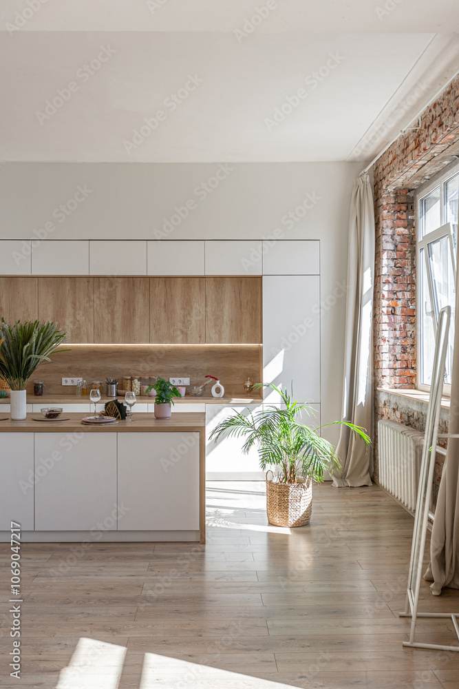 Fototapeta premium Bright and spacious living area featuring modern furniture and natural light in a stylish apartment in soft warm colors