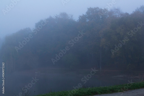Obraz na płótnie Autumn in Moldova, foggy landscape in the park. Thick fog early in the morning on the lake shore. w salonie