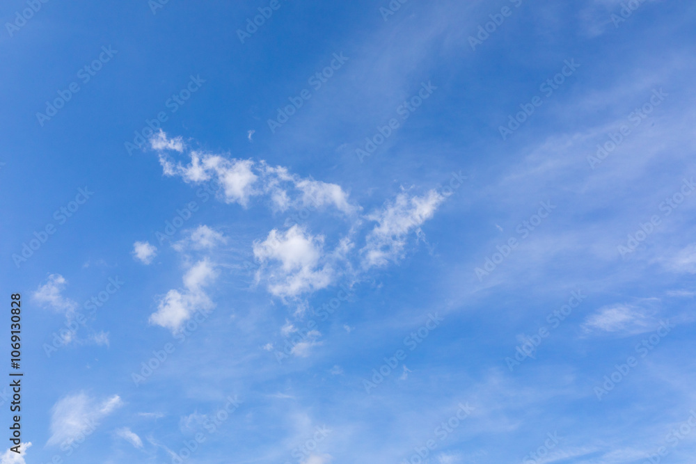 Blue sky with white clouds. The sky is clear and bright, and the clouds are scattered throughout the sky. Scene is peaceful and serene, copy space. High quality photo Blue sky with white clouds. The sky is clear and bright, and the clouds are scattered throughout the sky. Scene is peaceful and serene, copy space. High quality photo