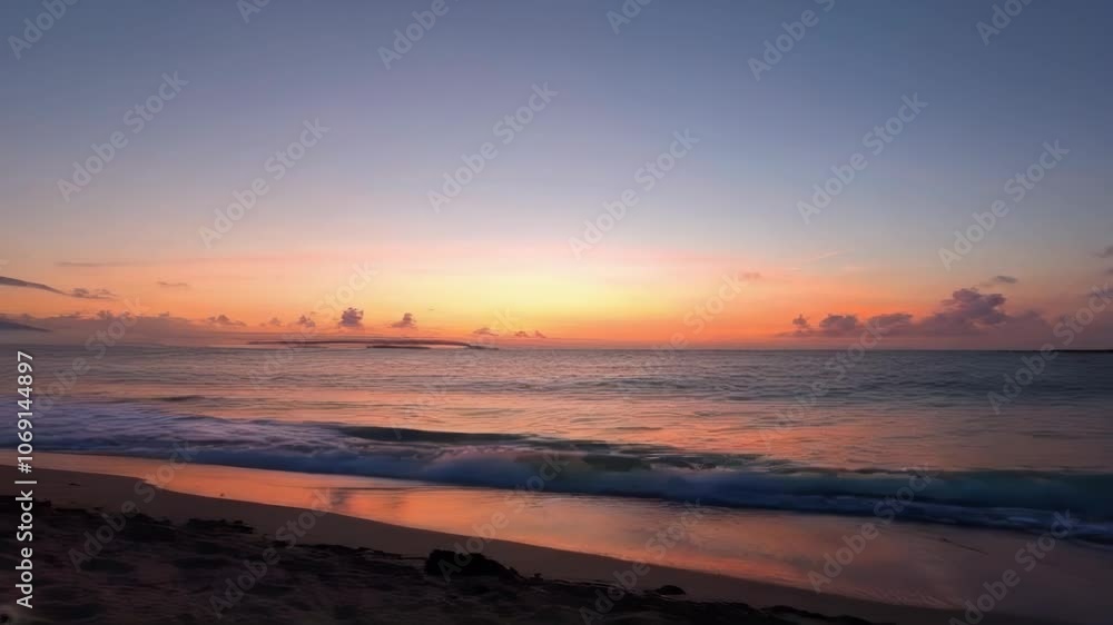 A tranquil beach scene at sunset, showcasing serene waves and a colorful sky, evoking peace and calm. A tranquil beach scene at sunset, showcasing serene waves and a colorful sky, evoking peace and calm.