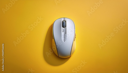 a computer mouse, isolated on a yellow pastel