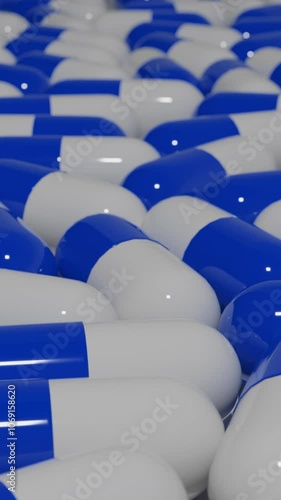 Overhead Dolly Shot of Colorful Capsules in Motion