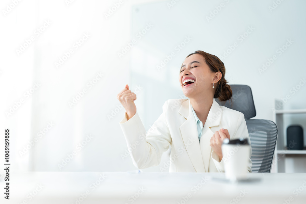 Confident businesswoman celebrating success with a joyful smile, embodying the spirit of achievement in a professional setting Confident businesswoman celebrating success with a joyful smile, embodying the spirit of achievement in a professional setting