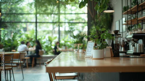 Fototapeta Naklejka Na Ścianę i Meble -  Inviting Cafe Space with Greenery and Modern Decor for Collaboration