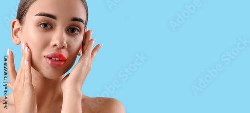 Young woman with cold sore ...