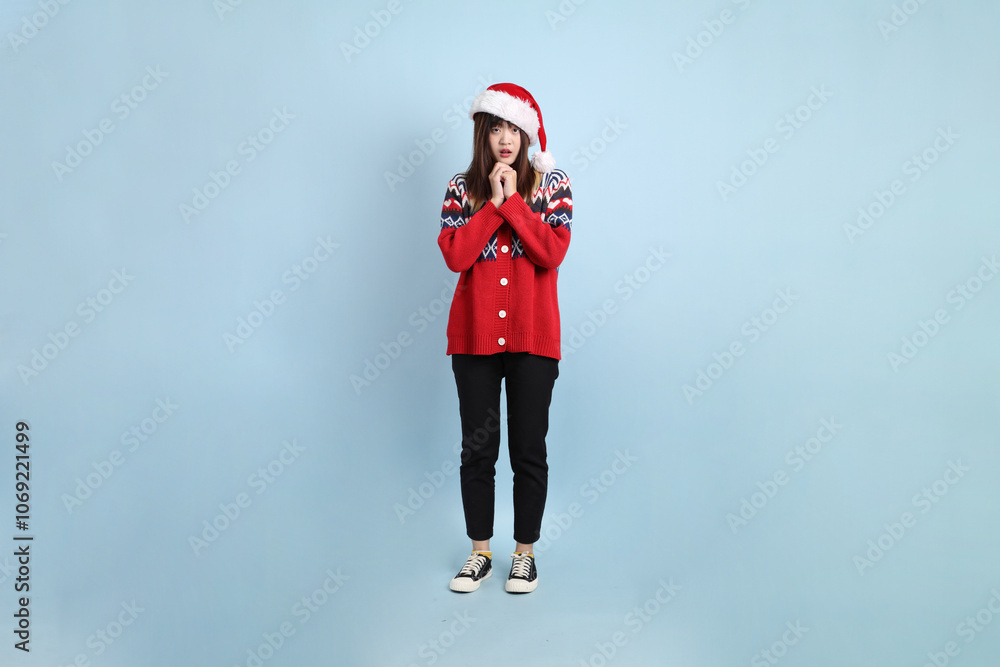 Woman wearing Santa hat Woman wearing Santa hat