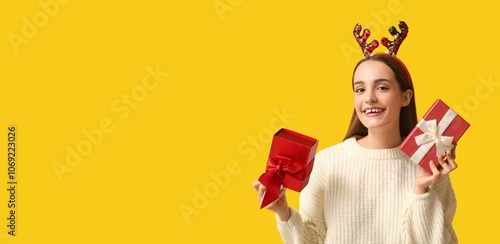 Young woman in sweater, wit...