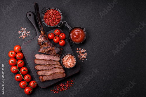 Grilled wagyu beef tomahawk steak with salt, spices and herbs