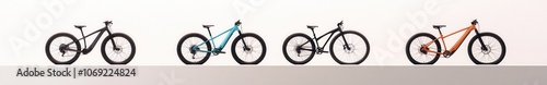 Assortment of modern electric mountain bikes on display photo