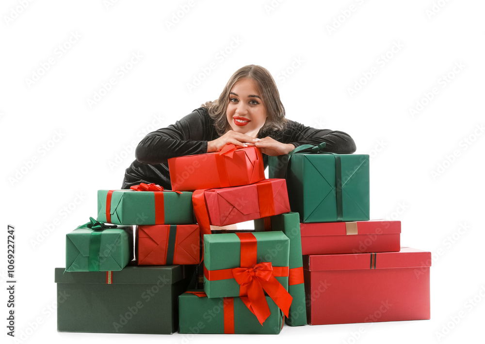 Young woman with gifts on white background. New Year celebration Young woman with gifts on white background. New Year celebration