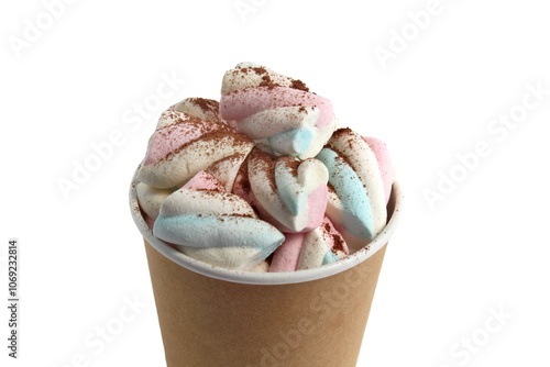 On a white background there is a cardboard cup with a pile of marshmallows sprinkled with cocoa.