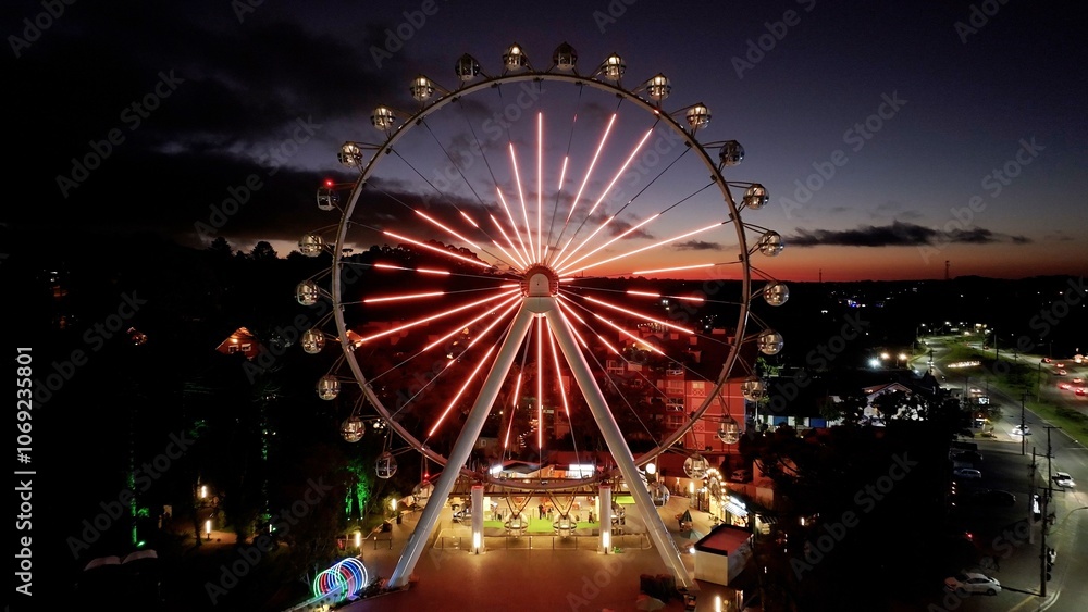 Stunning Ferris Wheel At Canela In Rio Grande Do Sul Brazil. Illuminated Ferris Wheel. Landmark Building. Sunset Scenery. Canela Brazil. Stunning Ferris Wheel At Canela In Rio Grande Do Sul Brazil. Stunning Ferris Wheel At Canela In Rio Grande Do Sul Brazil. Illuminated Ferris Wheel. Landmark Building. Sunset Scenery. Canela Brazil. Stunning Ferris Wheel At Canela In Rio Grande Do Sul Brazil.