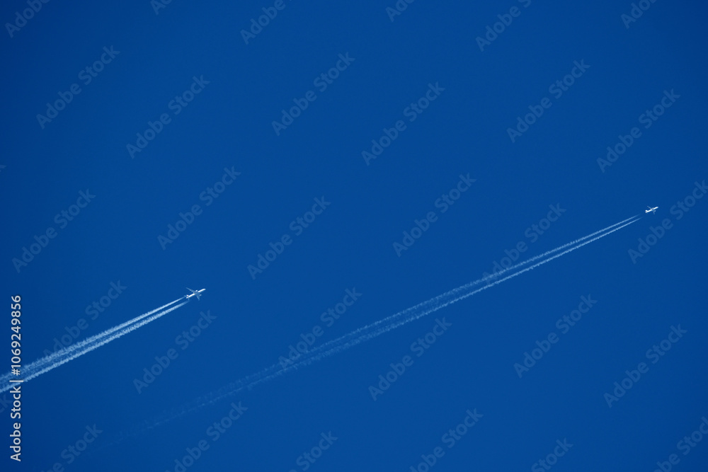 Airplane trails in the blue sky, contrails. Airplane trails in the blue sky, contrails.