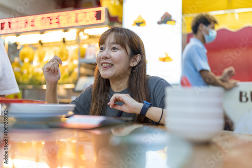 Photography Chinese Malaysian couple in their 34s enjoying meal at famous bak kut teh shop popular with locals in Kuala Lumpur, Malaysia