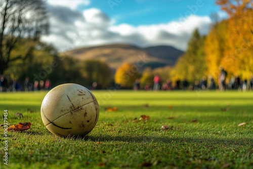 Shinty Ball on Highland Field During Cultural Sports Fest – Traditional Autumn Event photo