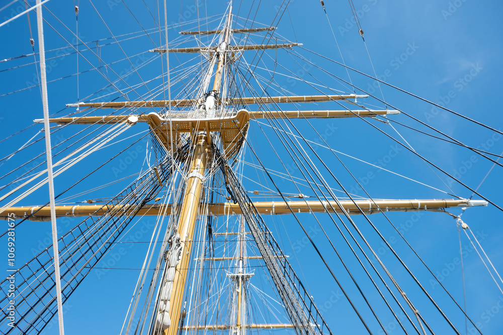 A group of colorful rigging and ropes is connected to the ship's mast to support and control the sails. Phuket, Thailand. A group of colorful rigging and ropes is connected to the ship's mast to support and control the sails. Phuket, Thailand.
