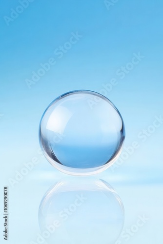 Transparent glass sphere reflecting the clear blue sky