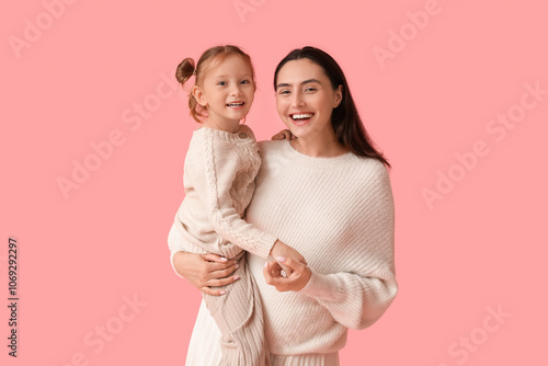 Mother holding in her arms ...