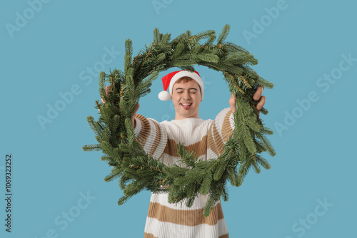 Young man with Christmas wr...