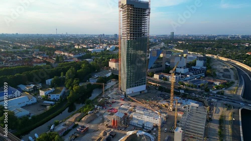 Berlin Estrel tower under construction. Stunning aerial view flight drone photo