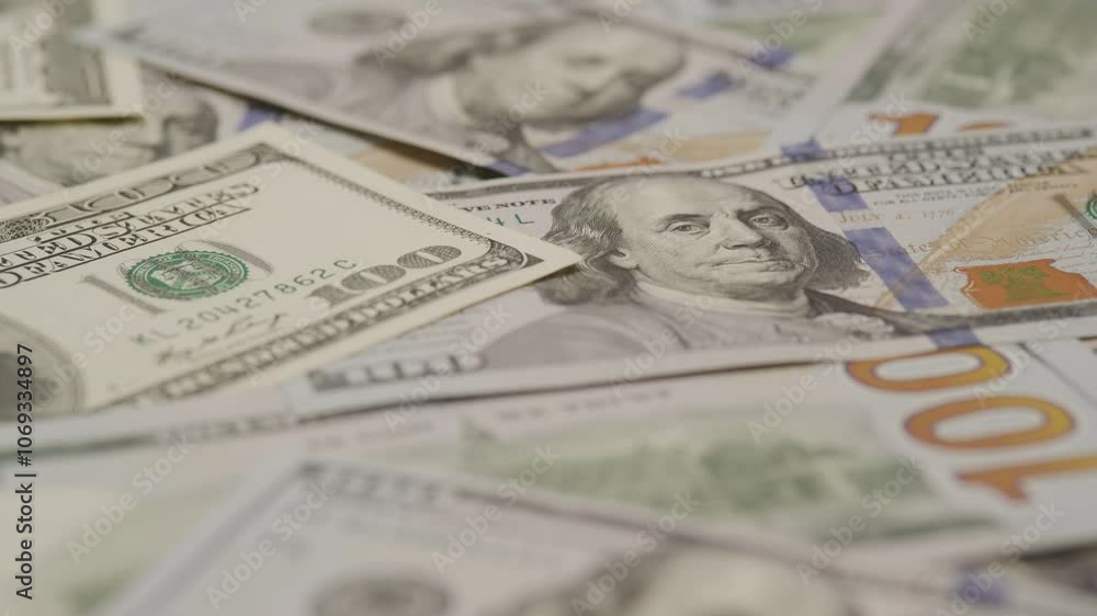 Close-Up of Scattered US 100 Dollar Bills Close-Up of Scattered US 100 Dollar Bills