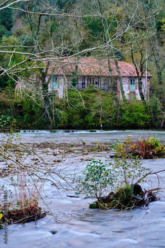 house by the Saja River in Cabezon de la Sal, Cantabria, Spain. photo