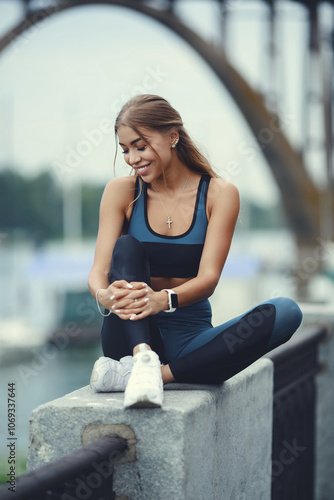 Fitness sport girl in fashion sportswear doing fitness exercise outdoor. Urban style 